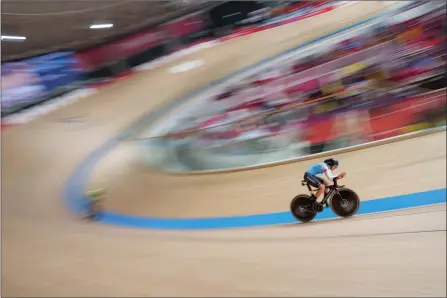  ?? The Associated Press ?? Canada’s Keely Shaw competes during the women’s C4 3000m Individual Pursuit at the Izu Velodrome during the Paralympic Games in Tokyo on Wednesday.