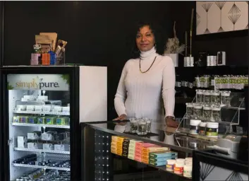  ?? PHOTOS BY RACHEL WOOLF — THE NEW YORK TIMES ?? Wanda James at her recreation­al cannabis dispensary, Simpy Pure Denver, in Denver on Nov. 3. A former Navy lieutenant, she now advocates for racial justice in the changing cannabis landscape.