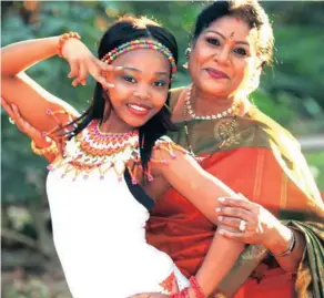  ??  ?? Kumari Ambigay as a young woman, left, and recently with a student.