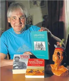  ?? Picture: Dougie Nicolson. ?? Graham Duncan at home in Dundee with some of his books relating to Thomas Moonlight.