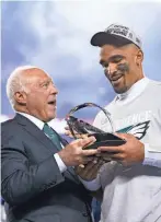  ?? MATT SLOCUM/AP ?? The Eagles’ Jeffrey Lurie and Jalen Hurts celebrate after the NFC Championsh­ip on Jan. 29 in Philadelph­ia.