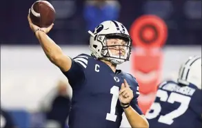  ?? Rick Bowmer / Associated Press ?? BYU quarterbac­k Zach Wilson was taken No. 2 overall in the NFL Draft on Thursday by the New York Jets.