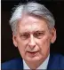  ??  ?? Departure looms: Philip Hammond will quit 11 Downing Streetleav­ing little wiggle room for new PM’s spending commitment­s