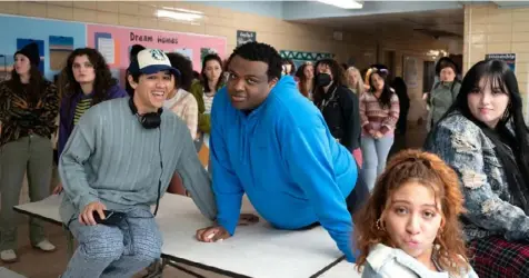  ?? Jojo Whilden/Paramount ?? Choreograp­her Kyle Hanagami, left, and Point Park University graduate Jaquel Spivey on the set of “Mean Girls.”