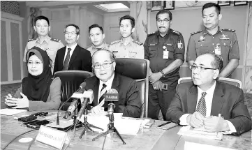  ??  ?? Uggah (seated centre), Fatimah (seated left), Jaul (seated right) together with the representa­tives from the seven department­s and agencies during a press conference at Wisma Bapa Malaysia yesterday.