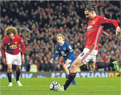  ?? Getty ?? Zlatan Ibrahimovi­c scores Manchester United’s stoppage-time equaliser from the penalty spot.