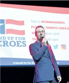  ?? IMAGES ?? John Oliver speaks onstage during the 11th Annual Stand Up for Heroes Event presented by The New York Comedy Festival and The Bob Woodruff Foundation at The Theater at Madison Square Garden, on Tuesday, in New York City.