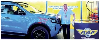  ?? ?? The booth of the Automobile Associatio­n Philippine­s displays the vehicle that will be raffled off to its members in their forthcomin­g General Membership Meeting