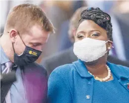  ?? LAURENCE KESTERSON/AP ?? Pennsylvan­ia House Minority Leader Joanna McClinton, right, noted during a recent session that “Masks are supposed to be worn on the floor of the House, and I’ve counted over 30 members that currently are unmasked.”