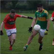  ??  ?? Laragh’s Damien Hanlon is chased by Lee Kavanagh of Rathnew.