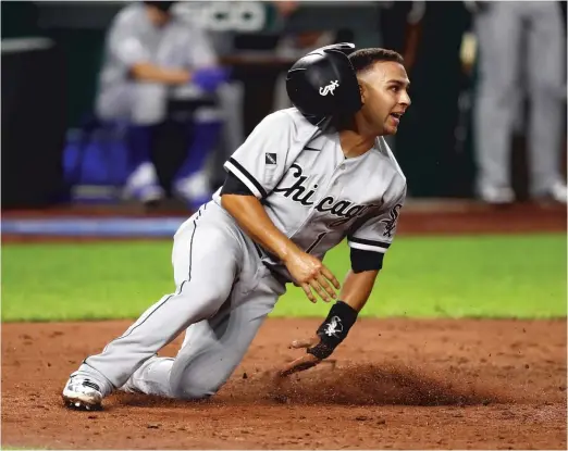  ?? JAMIE SQUIRE/GETTY IMAGES ?? Second baseman Nick Madrigal, who reached on a two-base error, is out at the plate after trying to score on a Leury Garcia single in the seventh inning.