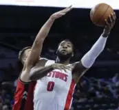  ?? DUANE BURLESON/THE ASSOCIATED PRESS ?? Detroit Pistons centre Andre Drummond had his way with the Raptors on Wednesday in the NBA pre-season, wracking up 16 points and 13 rebounds. “Drummond’s a tough guy,” said Lucas Nogueira, one the Raptors big men charged with defending against him.