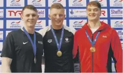  ??  ?? 0 From left: Ross Murdoch (silver medallist), Adam Peaty (gold) and James Wilby (bronze) after the 100m breaststro­ke final.