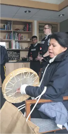  ?? THE VOLCANO ?? Burnaby RCMP stand by as protesters occupy Mayor Derek Corrigan’s office. They are concerned about demovictio­ns in the Metrotown area.