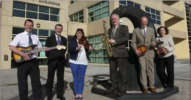  ??  ?? County Librarian Brendan Martin, Bryan Doyle, Chief Executive of Wicklow County Council, Cllr Nicola Lawless, Cllr Pat Fitzgerald, Director of Services Michael Nicholson and Ann Nolan from Music Generation at the launch of the music instrument in...