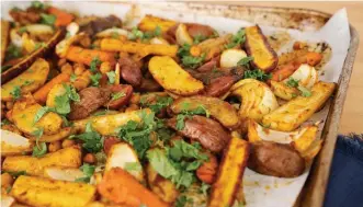  ??  ?? SPICY MELANGE: It’s worth turning on the oven for curry roasted carrots and fingerling potatoes.