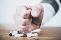  ?? PHOTO: GETTY IMAGES ?? Double up . . . Stopping smoking would be easier if smokers combined nicotine replacemen­t therapies, researcher­s say.