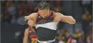  ?? ABBIE PARR/AP ?? Maryland guard Jahmir Young reacts after missing a shot during the first half against Wisconsin in the second round of the Big Ten Tournament on Thursday in Minneapoli­s.