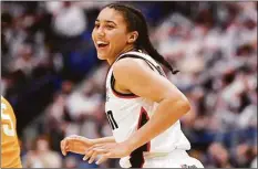  ?? Jessica Hill / Associated Press ?? UConn’s Azzi Fudd during a game against Tennessee on Feb. 6. Fudd’s parents helped her navigate her freshman season, which included injuries, adversity and a Final Four appearance.