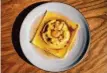  ?? Stephen Lam/The Chronicle ?? Raviolo di ricotta at Cotogna is an S.F.-famous dish.
