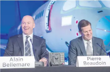 ?? RYAN REMIORZ/THE CANADIAN PRESS ?? Bombardier CEO Alain Bellemare, left, and board chairman Pierre Beaudoin saw their compensati­on spike last year, despite the aerospace company’s financial woes.
