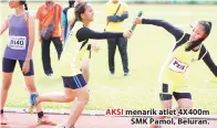  ??  ?? AKSI menarik atlet 4X400m SMK Pamol, Beluran.