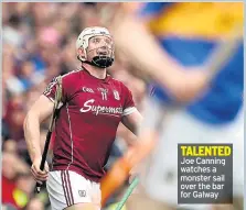  ??  ?? TALENTED Joe Canning watches a monster sail over the bar for Galway