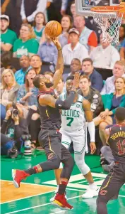  ?? — AFP ?? LeBron James of the Cleveland Cavaliers shoots the ball in the match against the Boston Celtics during Game Five of NBA Eastern Conference Finals at TD Garden. The Celtics won 96-83.