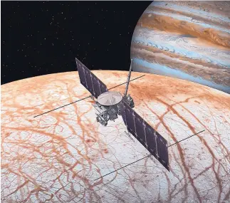  ??  ?? An artist’s rendering shows the proposed Europa Clipper mission to one of Jupiter’s moons. The craft would feature solar panels manufactur­ed by SolAero Technologi­es. COURTESY OF NASA