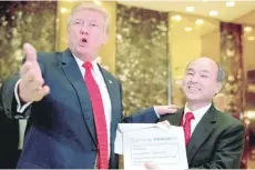  ?? — Reuters ?? President Donald Trump and SoftBank CEO Masayoshi Son speak to reporters at Trump Tower, in this file photo.