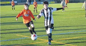  ??  ?? More action from Craigie 3G where DUSC U/13 (tangerine) beat Newtyle in the league.