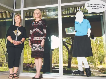  ?? POWERFUL MESSAGE: The Women’s Centre senior counsellor Di Plumb and JCU Vice Chancellor Professor Sandra Harding at the exhibition at the university’s Douglas campus. Picture: SCOTT RADFORD- CHISHOLM ?? What Were You Wearing?