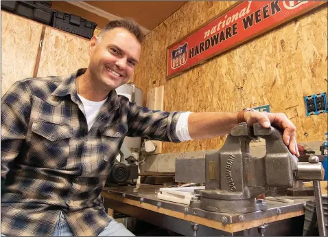  ?? (AP/Livingston County Daily Press & Argus/Gillis Benedict) ?? Justin Billard of Brighton Township, Mich., exhibits Nov. 9 one of his more prized restoratio­ns, a Columbian bench vise perhaps dating back to pre-1949.