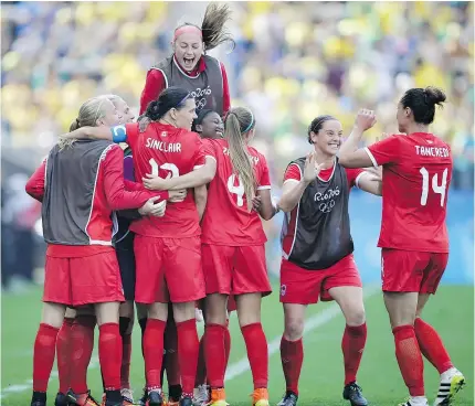  ?? — THE ASSOCIATED PRESS FILES ?? Head coach John Herdman says the plan for Canada over the next four years is to ‘take us from No. 4 in the world to No. 1.’ With players who can now push the pace with Burnaby’s Christine Sinclair, that should serve the stingy defensive squad well on...