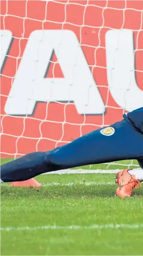  ??  ?? Born-again Craig Gordon looks set to win his 46th cap today