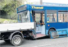  ?? Pictures: TIM THURSFIELD/CATERS ?? The truck and the damaged bus in which the driver collapsed over the wheel