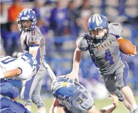  ?? [PHOTO BY BRYAN TERRY, THE OKLAHOMAN] ?? Dibble’s Colton Harwick carries the ball against Walters during Friday’s high school football game in Dibble.