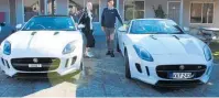  ?? ?? Janet Paape and Noel Morgan stand by their 2016 F-Type Jaguars.