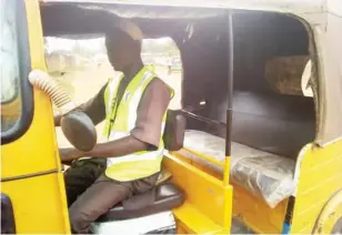  ??  ?? Abdulrahma­n Mukailu, an OPAY tricycle driver says it has made his business easier.