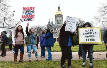  ?? Arnold Gold/Hearst Connecticu­t Media file photo ?? CT United Nurses rally for safe staffing in front of the Capitol building in Hartford before the inaugurati­on of Ned Lamont on Jan. 4, 2023.