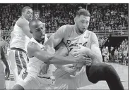  ?? AP/AL GOLDIS ?? Michigan State’s Joshua Langford (left) and Long Beach State’s Gabe Levin fight for a loose ball during Thursday’s game.