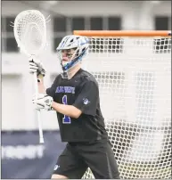  ?? John McCreary / For Hearst Connecticu­t Media ?? Darien’s Andy Demopoulos sets his position in net against Wilton on April 18.