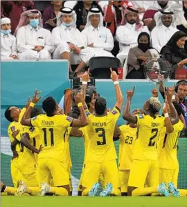  ?? Natacha Pisarenko Associated Press ?? ECUADOR PLAYERS celebrate the team’s first goal by Enner Valencia in the first half of the opening game of the 2022 World Cup, a 2-0 win over host Qatar.