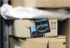  ?? AP ?? In this May 9, 2017, file photo, a package from Amazon Prime is loaded for delivery in New York.