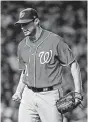  ?? Jon Durr / Getty Images ?? The Nationals wasted seven shutout innings from Max Scherzer on Sunday night.