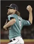  ?? AP photo ?? Mike Leake of the Mariners pitches during the seventh inning of Seattle’s 10-0 win over the Los Angeles Angels on Friday.