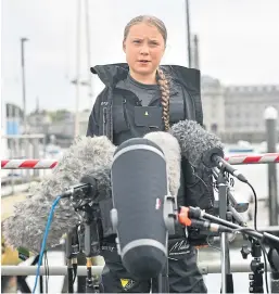  ?? Picture: PA. ?? Climate activist Greta Thunberg speaks to the media before her voyage to the US from Plymouth on the Malizia II.