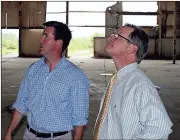  ?? Doug Walker / Rome News-Tribune ?? Hardman Knox (left), a principal with HK Shannon, shows Rome Floyd Chamber President Al Hodge some of the changes to the former Florida Tile building.