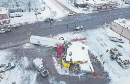  ?? Provided by Utah Highway Patrol ?? This photo taken in January by a Utah Highway Patrol drone shows a big rig that crashed into a restaurant in Wellington, Utah.