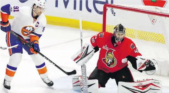  ?? FRED CHARTRAND/THE CANADIAN PRESS ?? Craig Anderson, above, was phenomenal in his return to the lineup Saturday, posting a 33-save shutout against the New York Islanders.